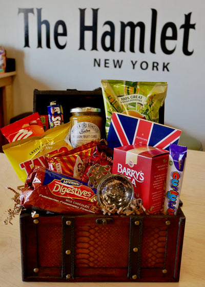Gift basket from The Hamlet British store filled with assorted British snacks, treats and merchandise